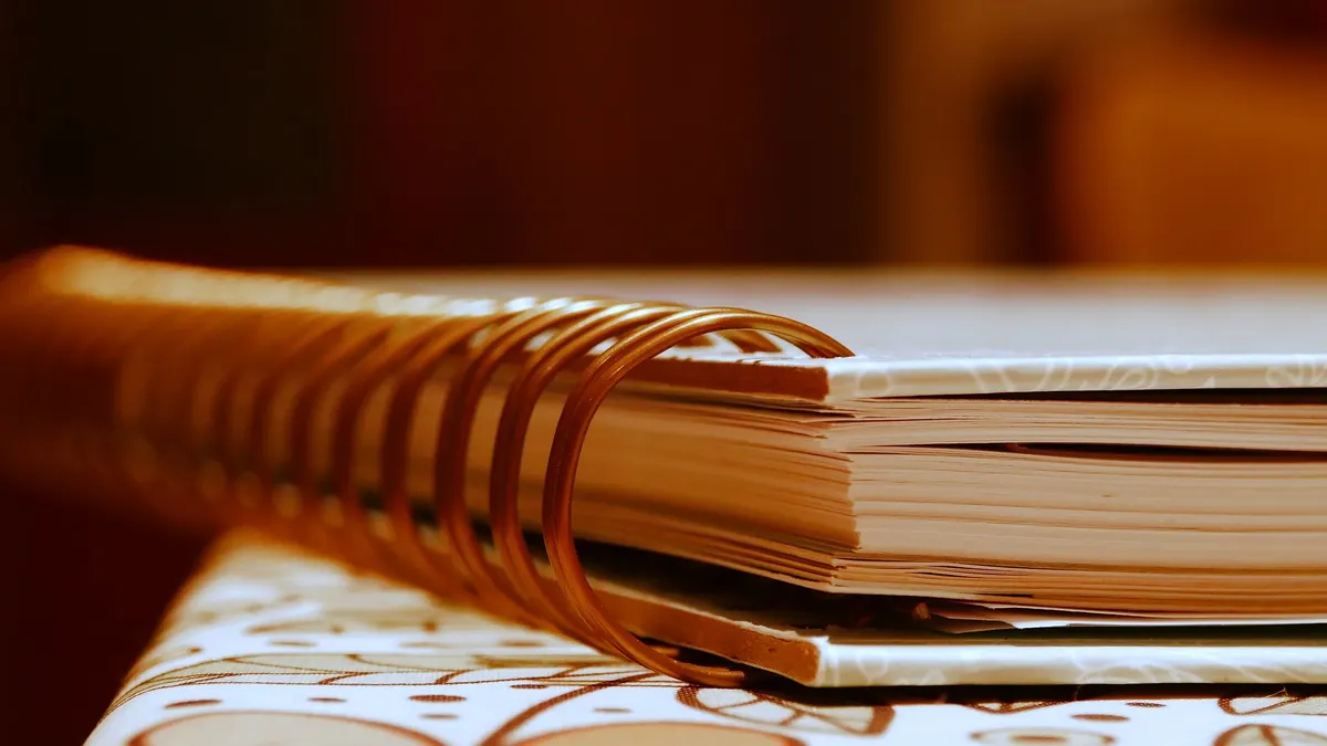 Spiral-bound notebook on a table